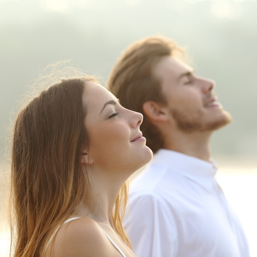  couple-of-man-and-woman-breathing-deep-fresh-air-m.jpg